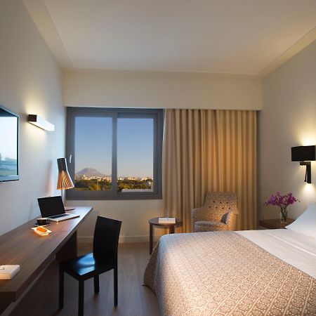فندق أكويلا أتلانتس كاندية المظهر الخارجي الصورة A room at the Athens Hilton