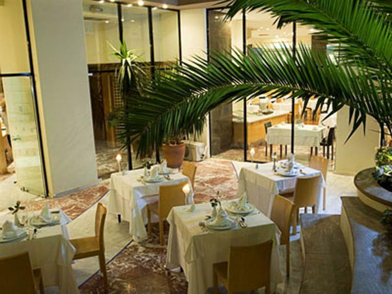 فندق أكويلا أتلانتس كاندية المظهر الخارجي الصورة Restaurant in the hotel